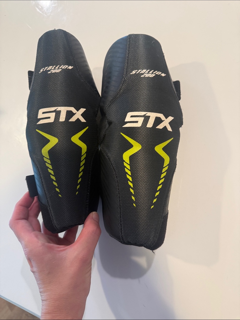 STX Stallion Lacrosse Arm Guards in Black with Neon Yellow Accents